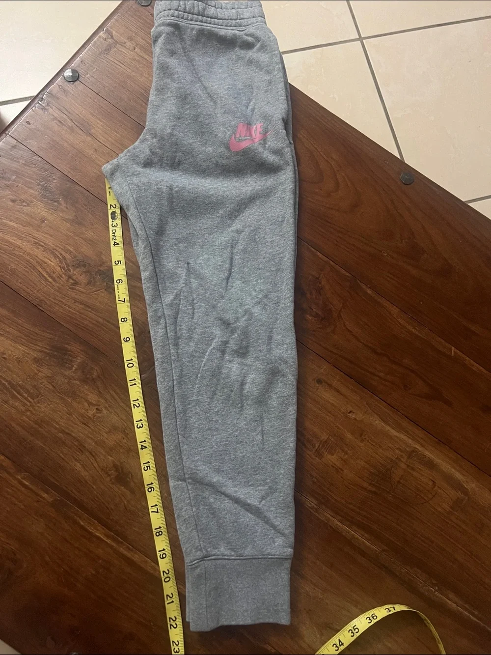 Nike Gray girl’s Sweatpants with Pink Swoosh